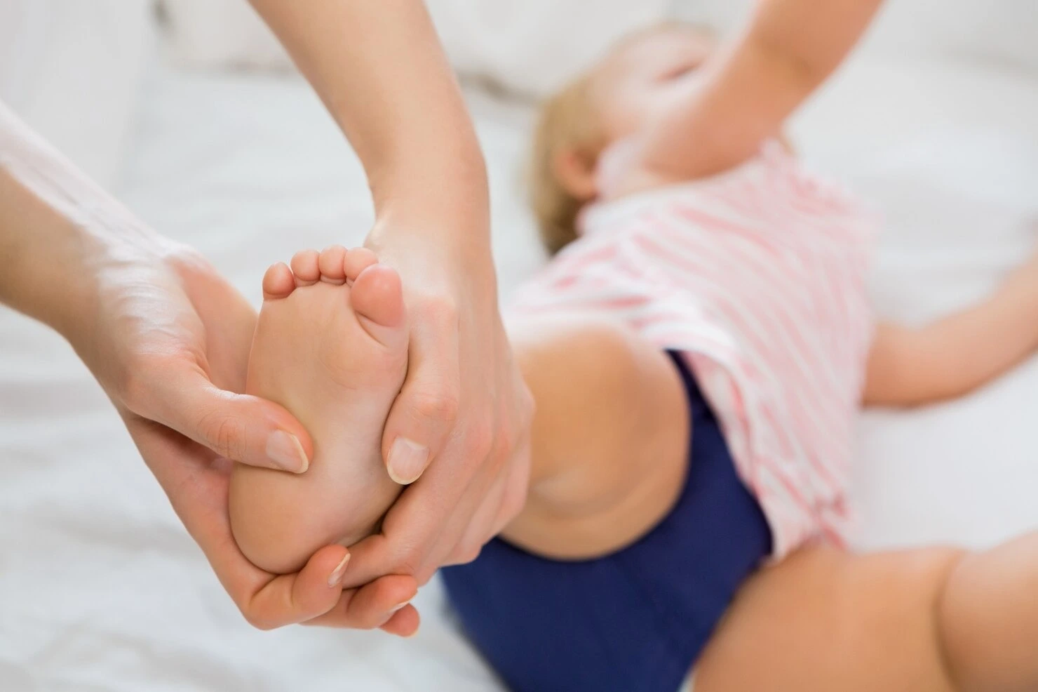 Child foot examination for custom orthotics at Precision Podiatry in Alma, MI